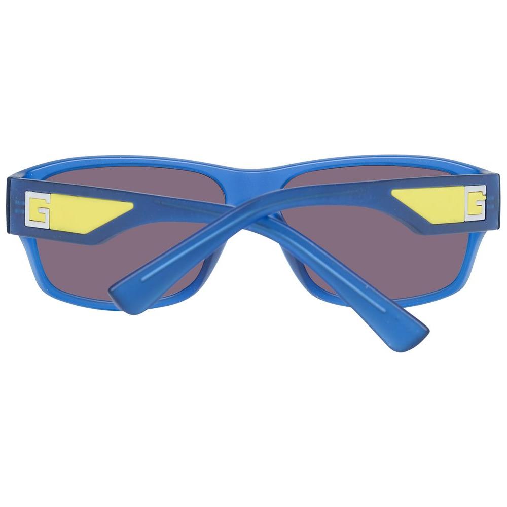 Guess blue unisex trapezium sunglasses with brown gradient lenses, full-rim design, plastic frame, and branded case included.