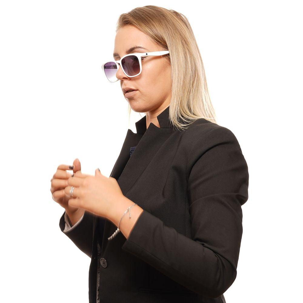 Person wearing Spy White Unisex Sunglasses with white plastic frame and purple gradient lenses, offering 100% UVA & UVB protection.
