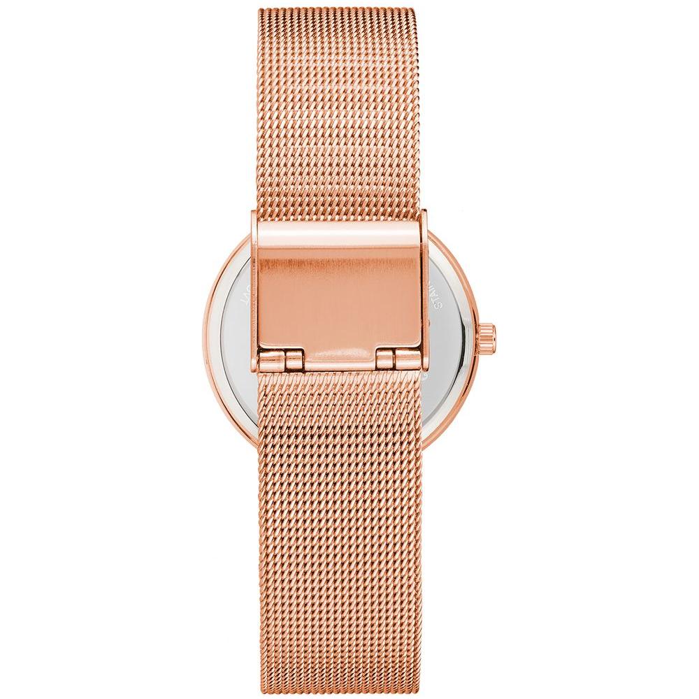 Rose gold Juicy Couture women's watch with bangle closure and stainless steel mesh strap, featuring quartz analog display.