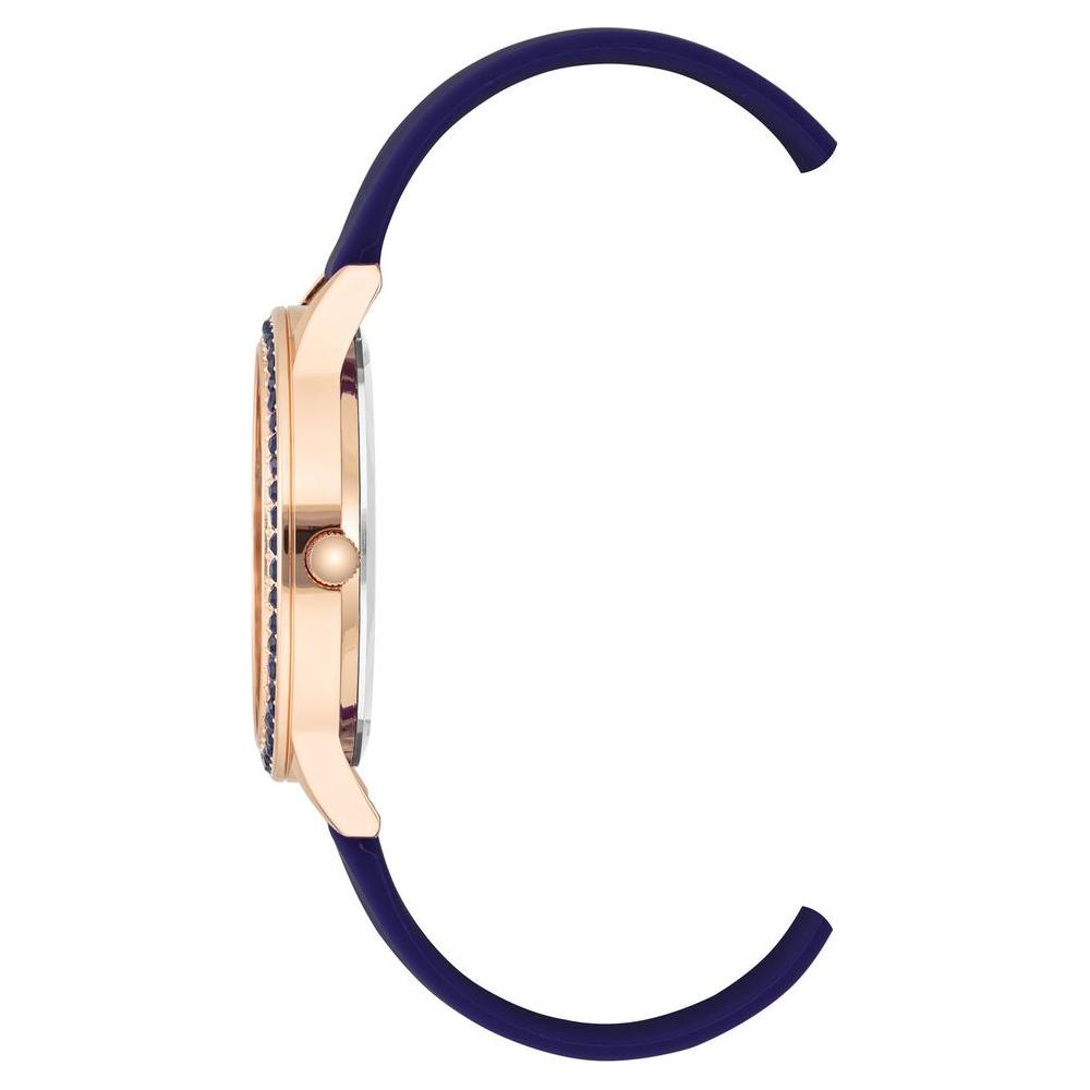 Side view of Juicy Couture Rose Gold Women's Watch with blue silicon strap and rhinestone facing
