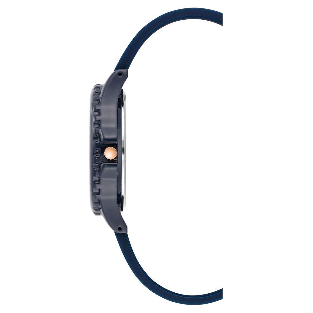 Side view of Juicy Couture blue women's watch with Rhine stone facing, blue silicon strap, and stainless steel case.