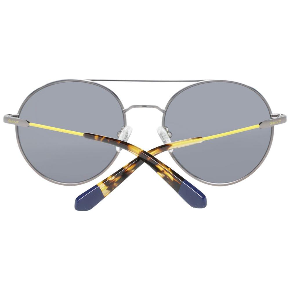 Gant gray men's round sunglasses with gunmetal metal frame and gray plastic lenses, featuring full-rim design, UVA & UVB protection.