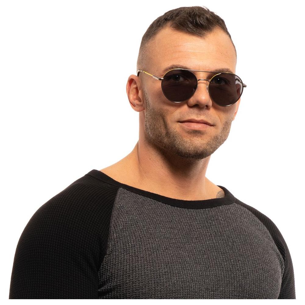 Man wearing Gant gray round sunglasses with gunmetal frame, black and gray shirt, full-rim design, offering 100% UVA & UVB protection.