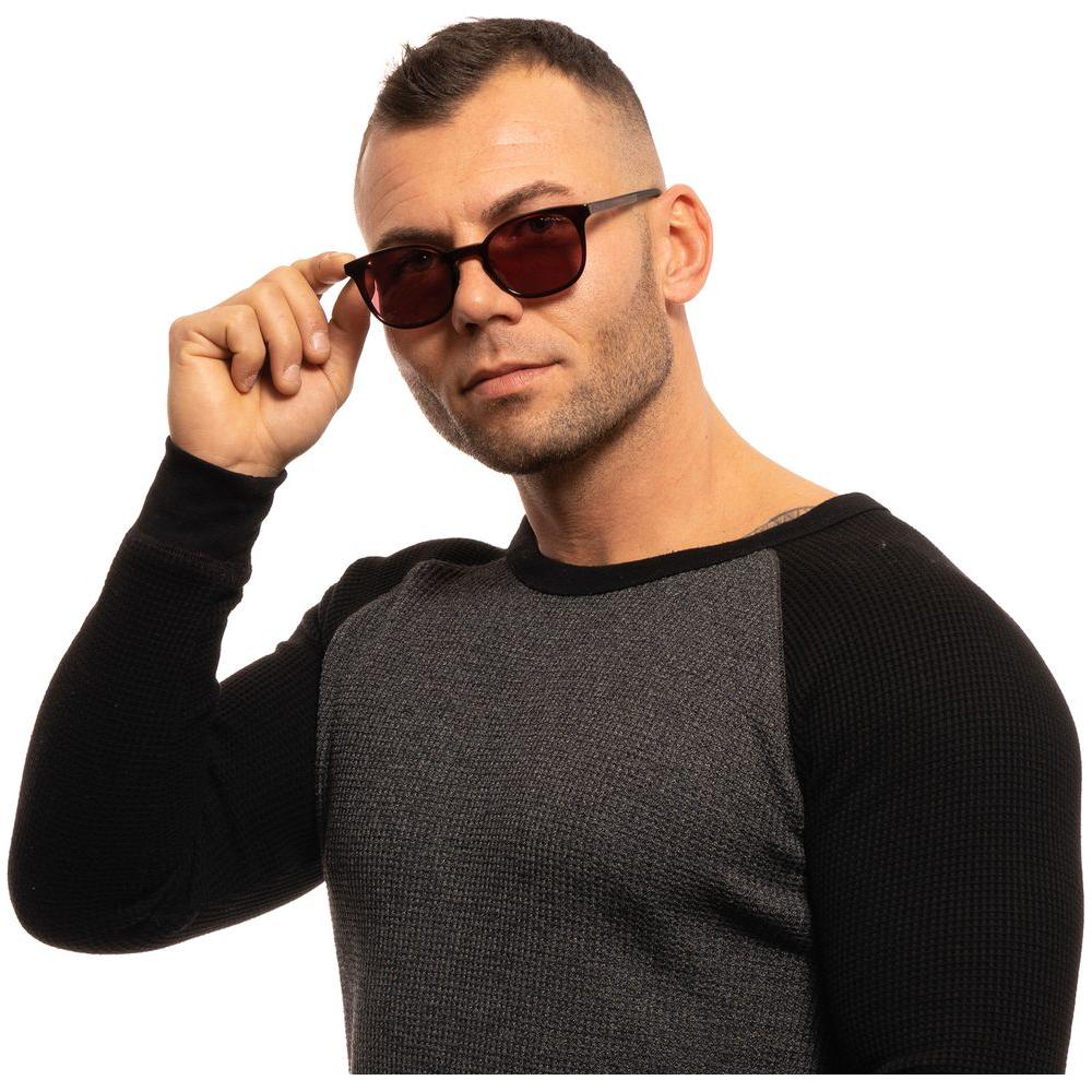 Man wearing Gant brown square sunglasses with burgundy lenses, featuring a full-rim plastic frame and 100% UVA & UVB protection.