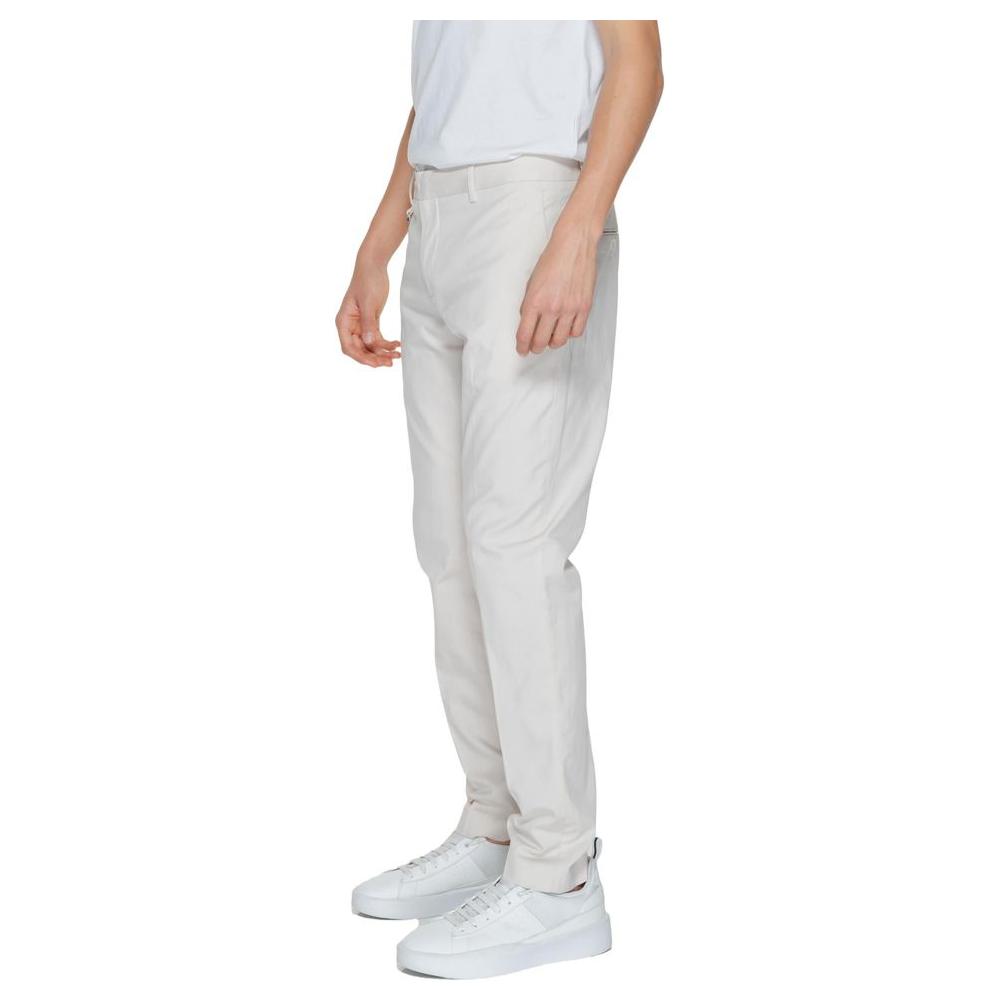 Antony Morato beige cotton jeans, men's suit trousers from spring/summer collection, shown on model with white sneakers