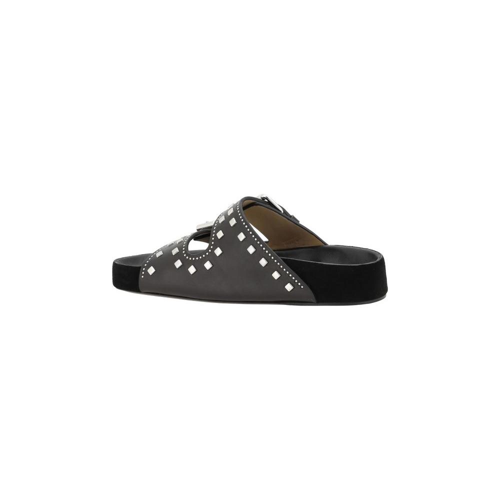 Side view of Isabel Marant Lennyo Leather Sandals with studded buckles and flat sole, ideal for a casual boho summer look.