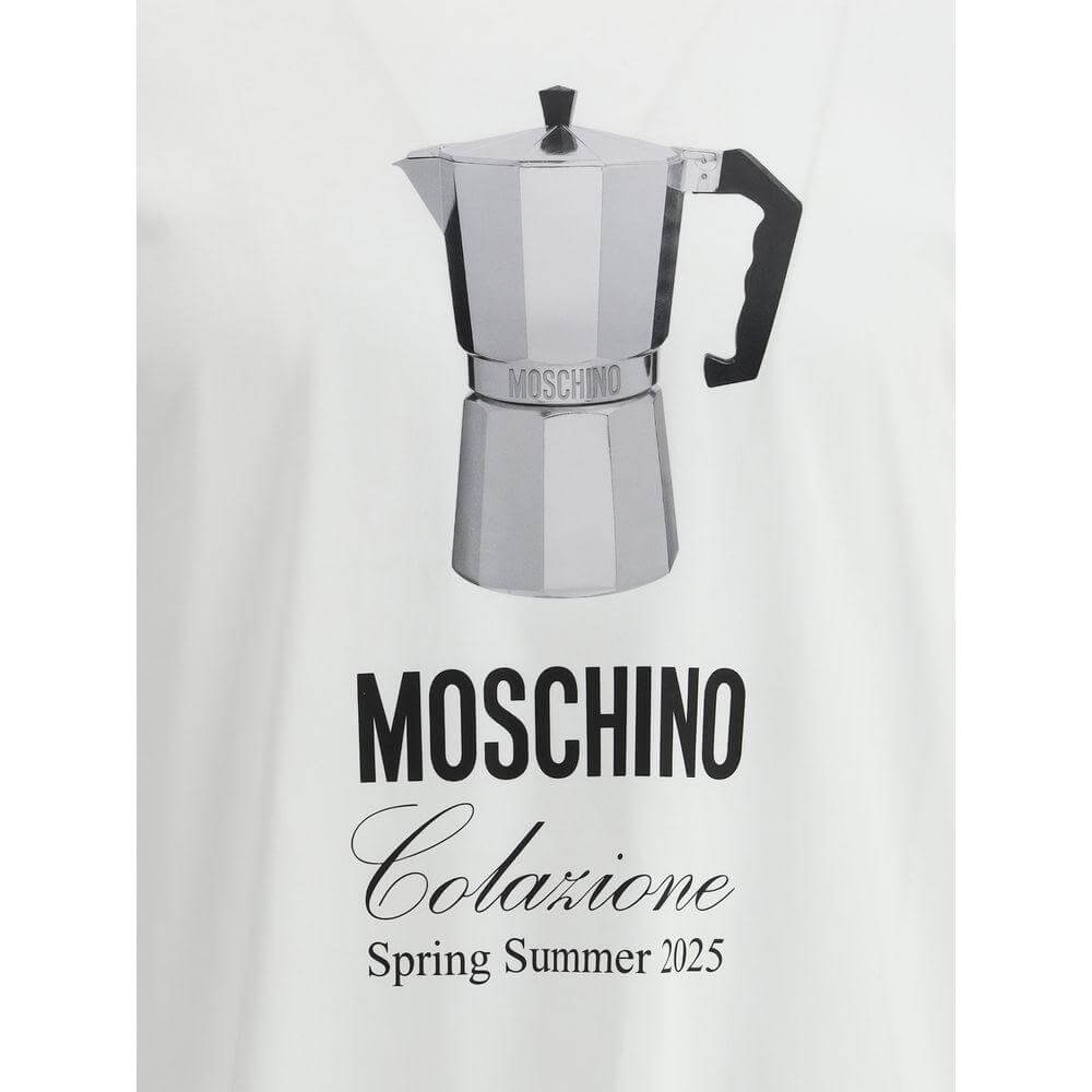 Moschino T-Shirt featuring bold coffee pot print and iconic monogram from Spring Summer 2025 collection, stylish and versatile.