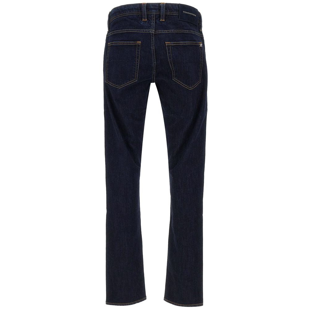 Back view of Tramarossa dark blue cotton jeans, regular fit, with suede patch and metal logo on rear pockets.