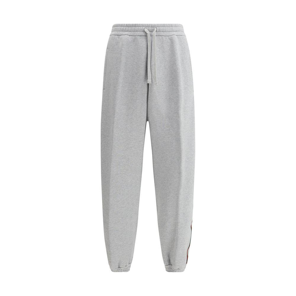 Gucci cotton sweatpants with colored side bands, featuring iconic monogram on back pocket, elasticated waistband, and mélange pattern.
