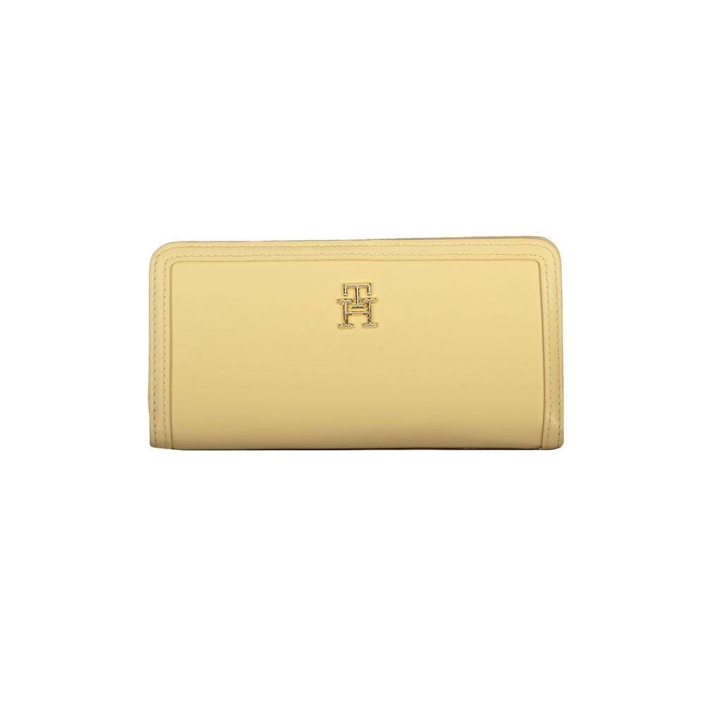 Tommy Hilfiger beige polyethylene wallet with logo, featuring 4 compartments, external pocket, card slots, and snap closure.
