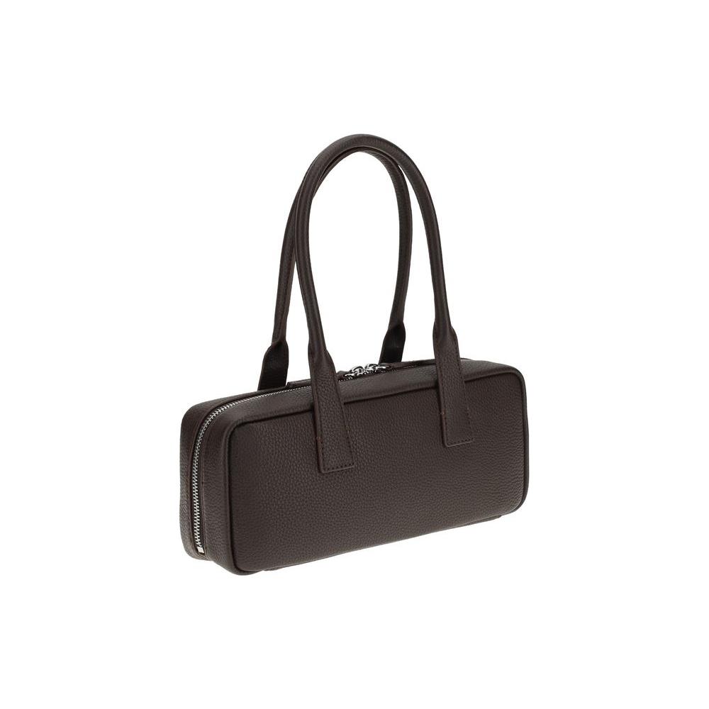 Staud The Dude Shoulder Bag in grained leather with dual round handles and zippered top closure for secure storage.