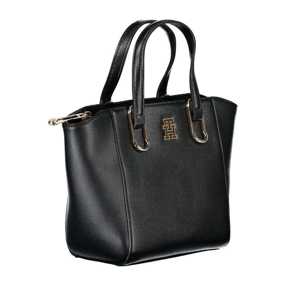 Tommy Hilfiger black polyethylene handbag with two handles, adjustable shoulder strap, internal pocket, zip closure, and logo detail.