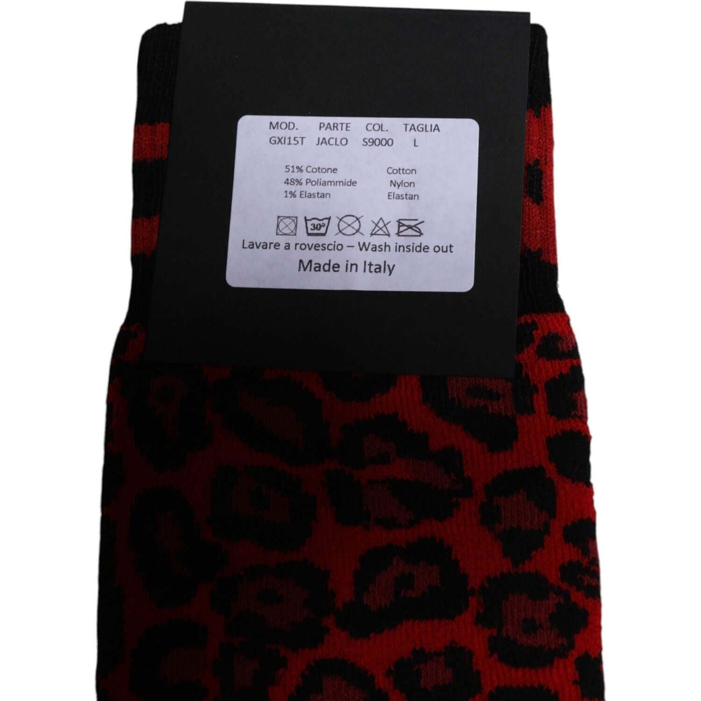 Dolce & Gabbana red and black leopard print mid-calf men's socks with label showing material details, 51% cotton, Made in Italy.