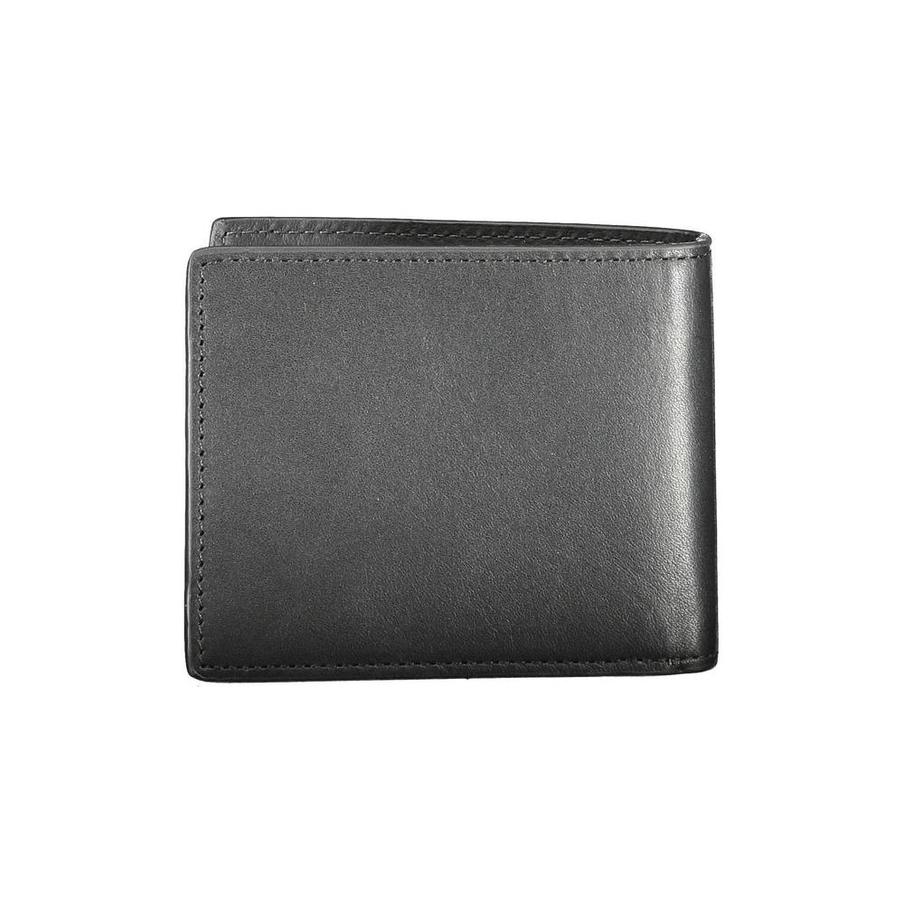Tommy Hilfiger black leather men's wallet with signature logo, featuring a sleek, elegant design and double compartment space for cards.