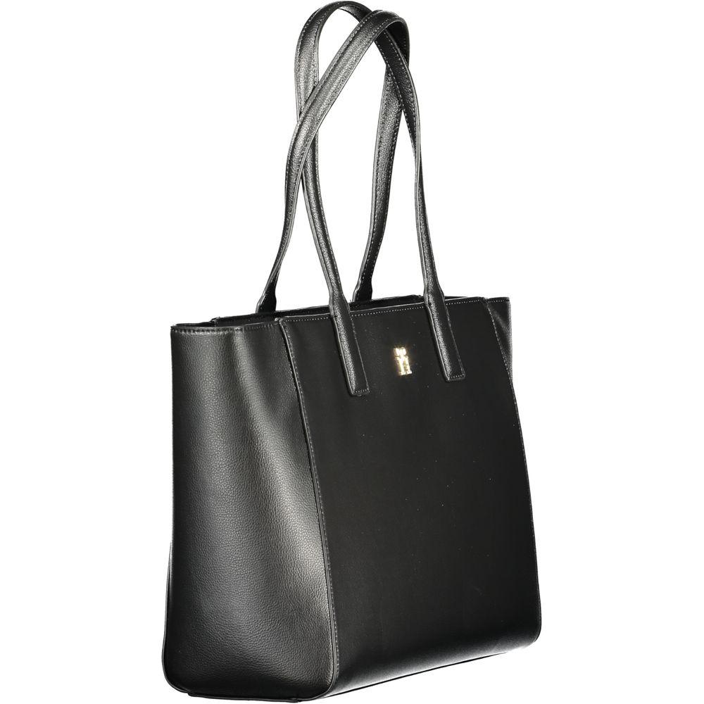 Tommy Hilfiger black recycled polyester women's handbag with 2 handles, eco-friendly design, iconic logo, and zip closure.