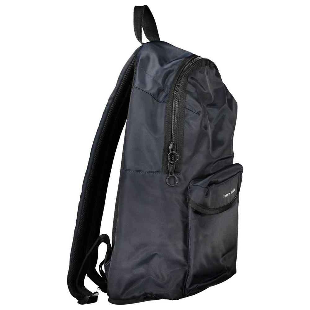Tommy Hilfiger blue polyester men's backpack with adjustable straps and laptop compartment, side view showing external pocket.