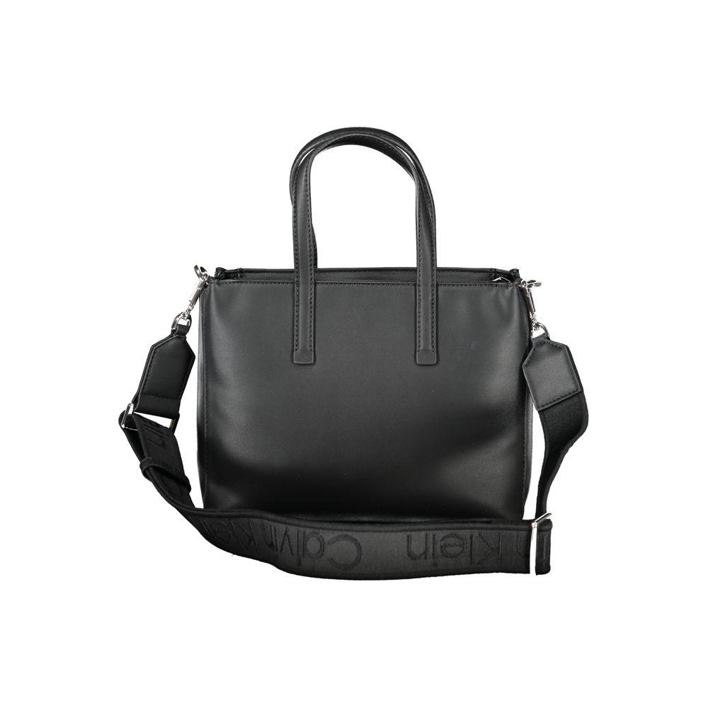 Calvin Klein black polyester women's handbag with dual handles and removable shoulder strap, featuring a chic urban design.