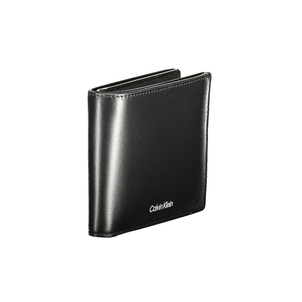 Calvin Klein black leather men's wallet with RFID-blocking, dual compartment, coin purse, and card slots for stylish security.