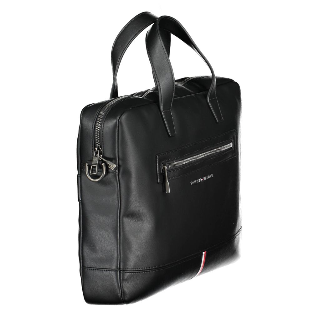 Tommy Hilfiger Black Polyethylene Handbag with handles, adjustable strap, external pocket, and laptop compartment.