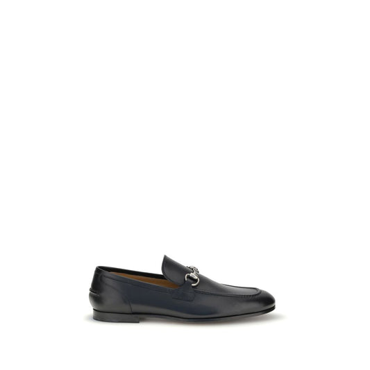 Gucci Black Calf Leather Bos Taurus Slip-On Loafers with Morsetto detail and embossed logo for formal and casual looks.