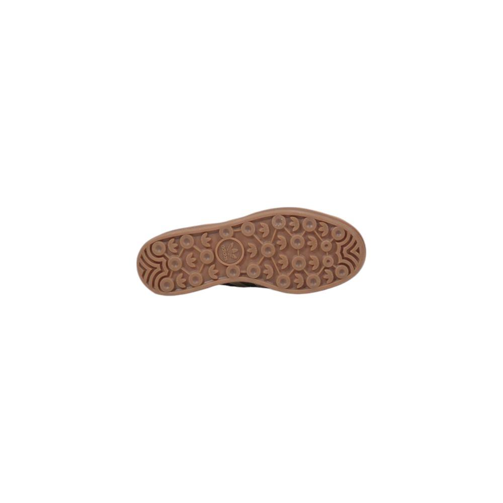 Sole of Adidas Cream Suede Leather Sneaker showing tread pattern for stylish and comfortable grip.