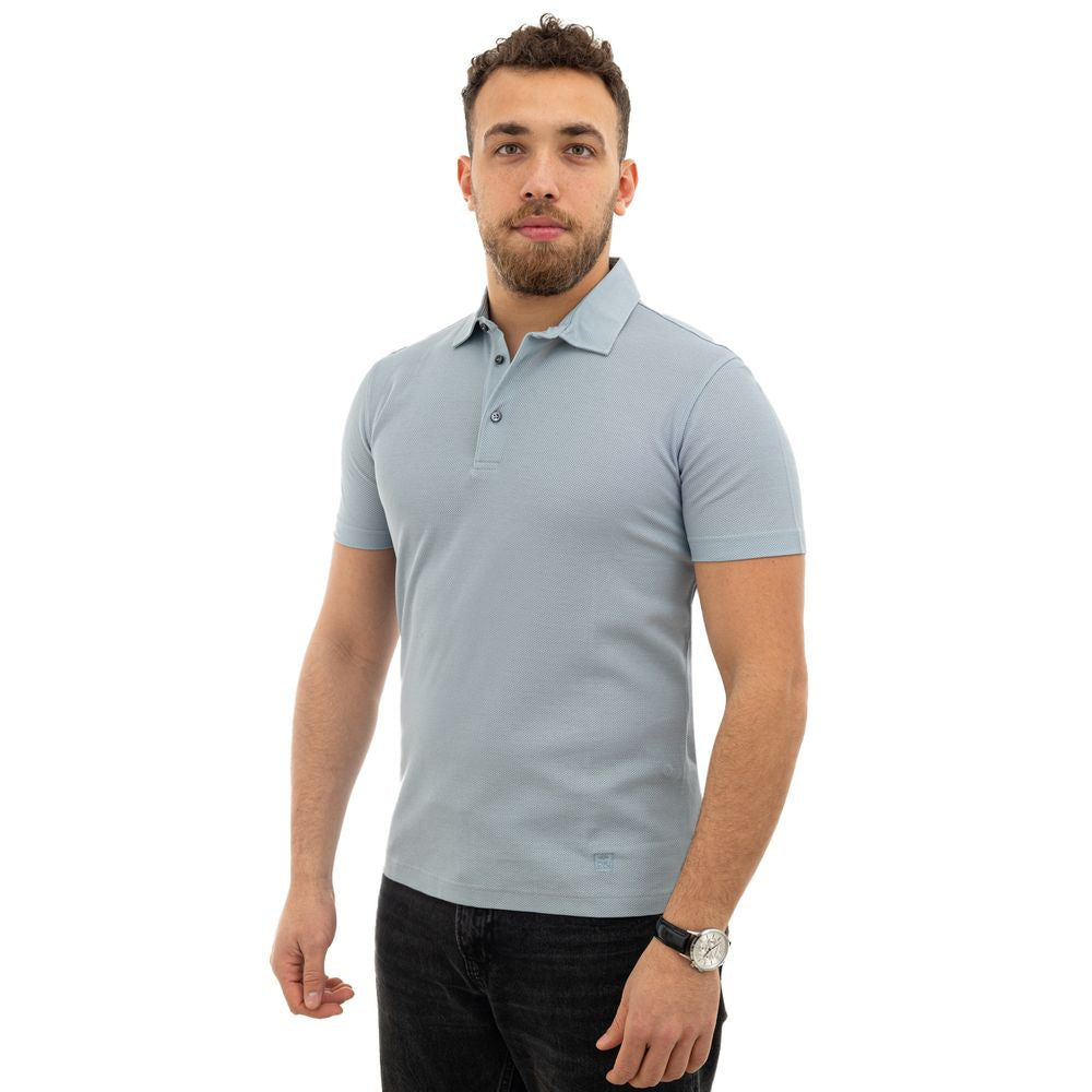 Man wearing Corneliani light blue cotton polo shirt with classic collar, short sleeves, made in Italy. SKU: 24OTT89.