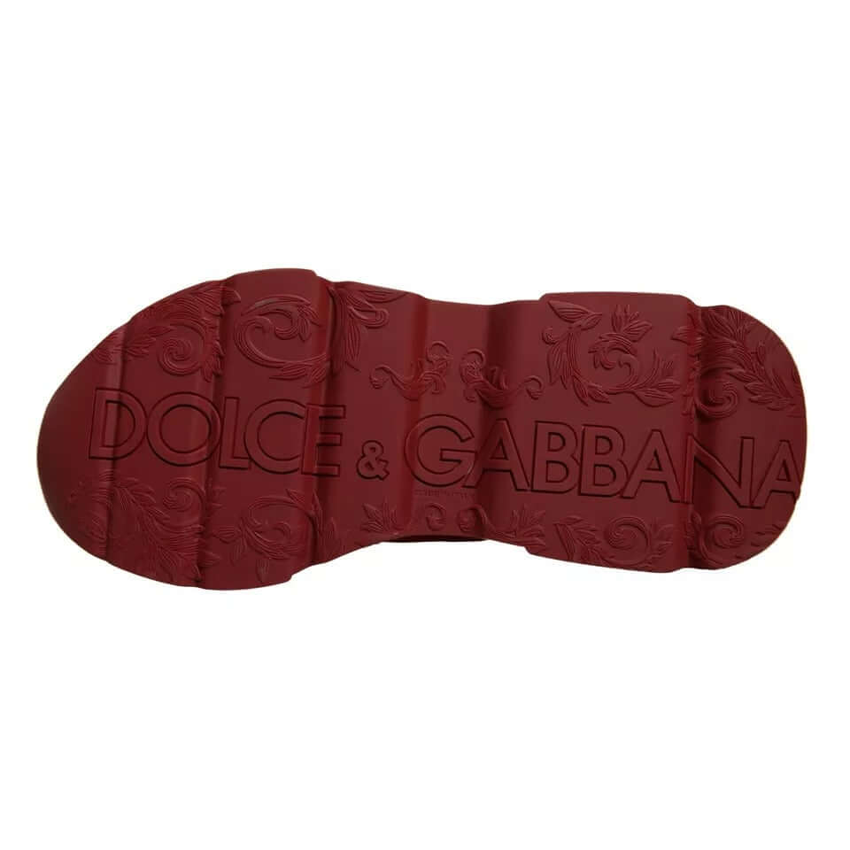 Dolce & Gabbana red rubber sole with embossed logo on Daymaster sneakers.