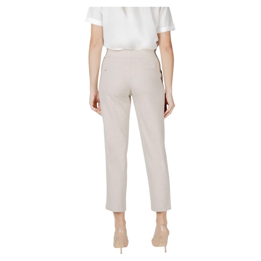 Back view of Street One beige viscose trousers for women, featuring a regular fit with buckle belt, ideal for stylish comfort.