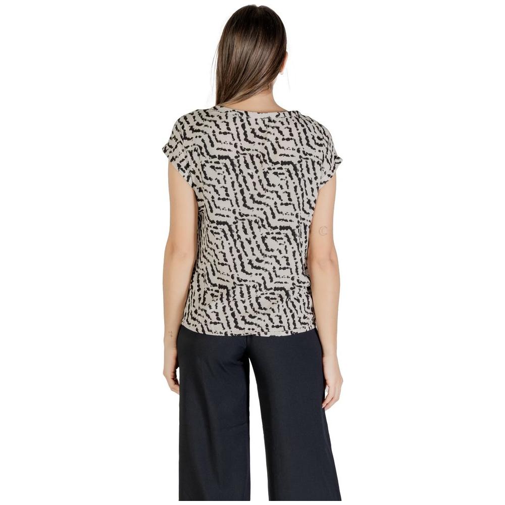 Back view of woman wearing a Street One bicolor viscose shirt with short sleeves and abstract pattern.