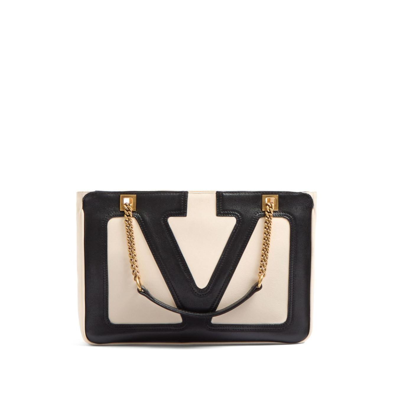 Front view with bag zipped and handles upright.