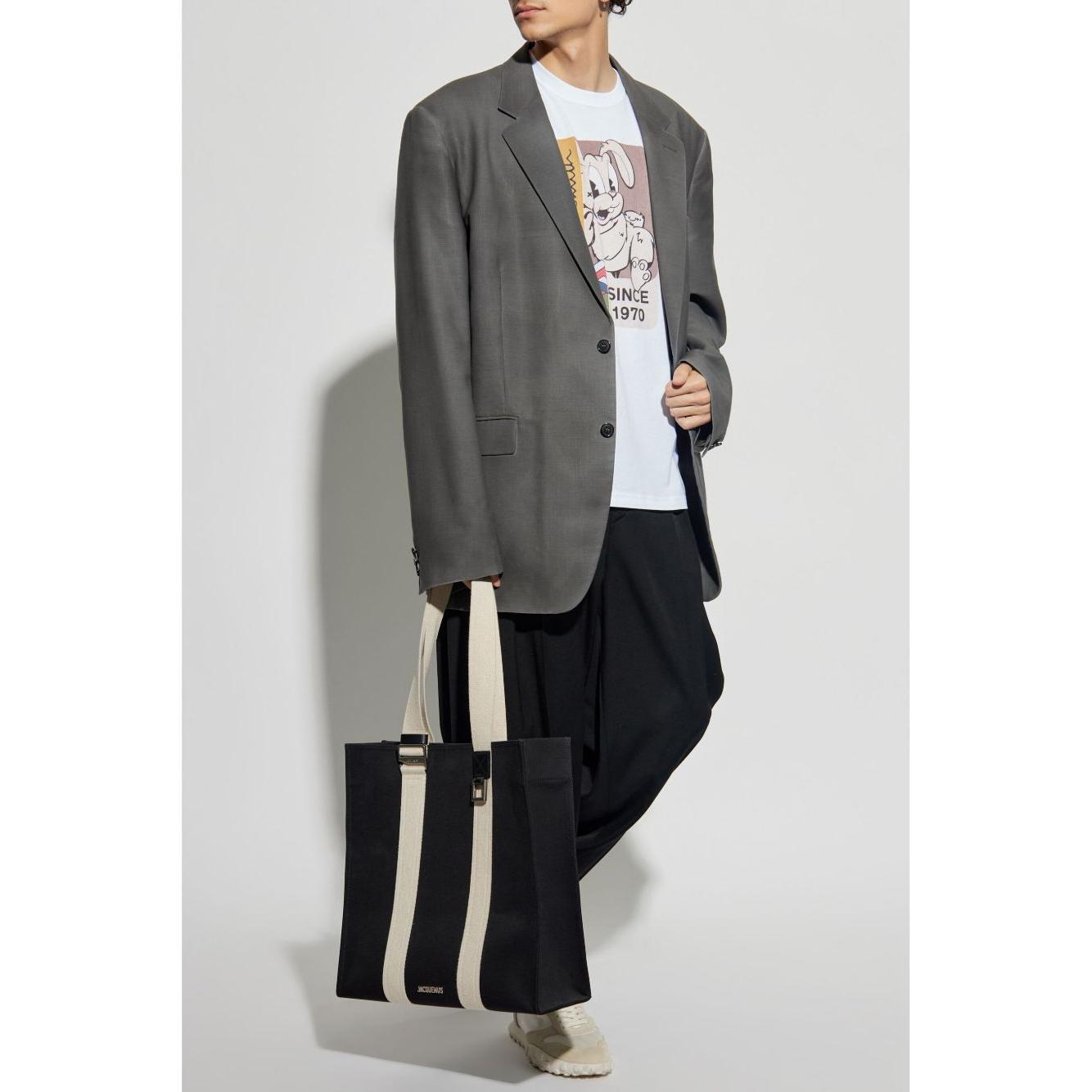Front view with bag zipped and handles upright.