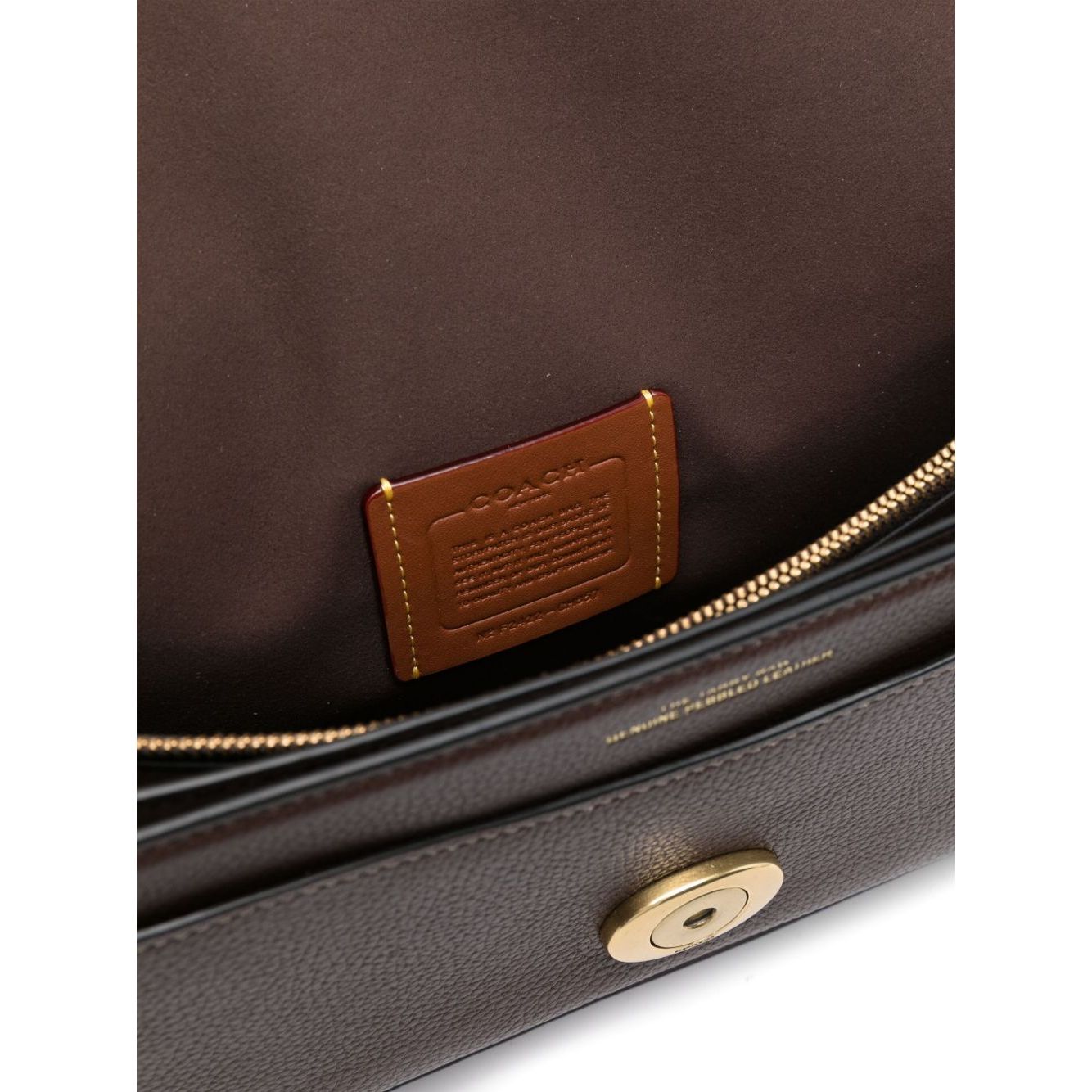 Front view with bag zipped and handles upright.