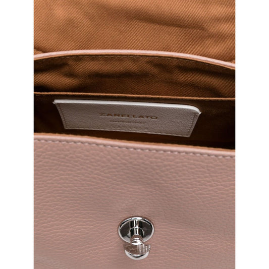 Interior view of Zanellato Postina Daily Baby leather handbag with twist-lock closure, showing inner tan lining and logo patch.