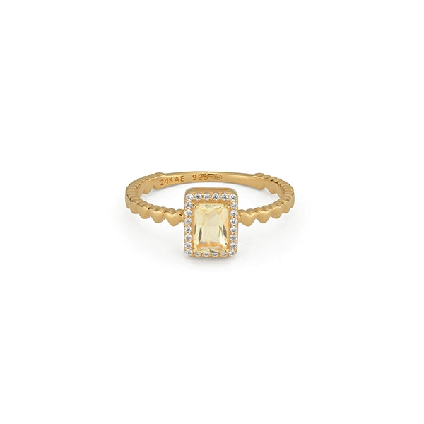24KAE JEWELS JEWELRY Mod. 12472Y/60 elegant gold ring with a central gemstone and diamond accents, showcasing premium design.