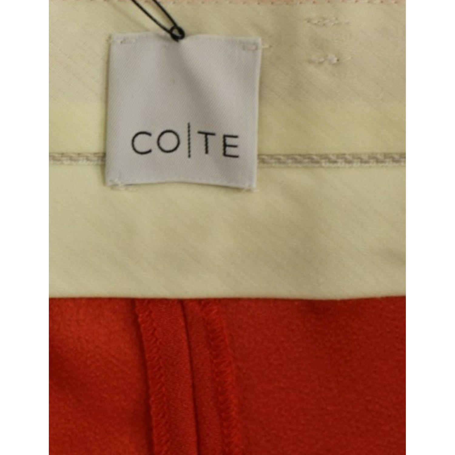 CO|TE Orange boyfriend stretch pants
