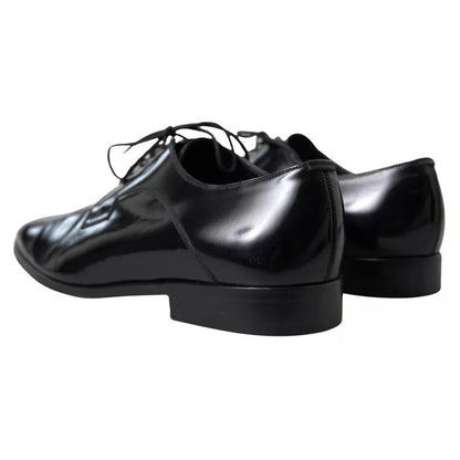 Dolce & Gabbana Black Polished Leather Formal Dress Shoes with logo details, showcasing elegant craftsmanship, slightly preowned condition.