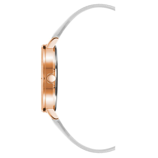 Side view of Juicy Couture gold women's watch with white leatherette strap and rhinestone face, quartz movement, and analog display.