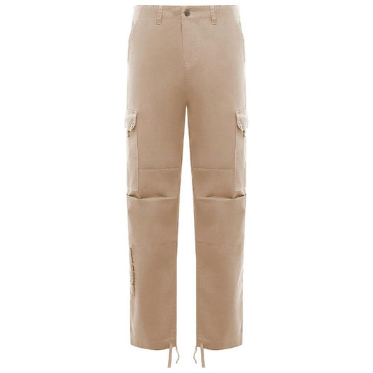 Comme Des Fuckdown beige cotton cargo pants with large front pockets, side pockets, back pockets, button zip fastening, ankle drawstrings.