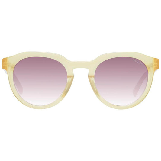 Guess yellow men's sunglasses with full-rim plastic frame in yellow, gradient brown lenses, and round style. Includes branded case.