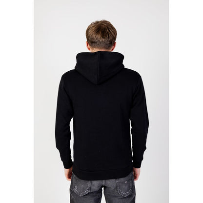 Back view of man wearing Jack Jones Black Polyester Hoodie with drawstring hood and full zip design.