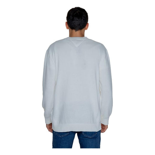 Back view of a Tommy Hilfiger white cotton sweater from the Autumn/Winter collection, modeled by a man wearing jeans.
