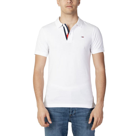 Men's white Tommy Hilfiger cotton polo shirt, fall/winter collection, front view with denim jeans, casual style.