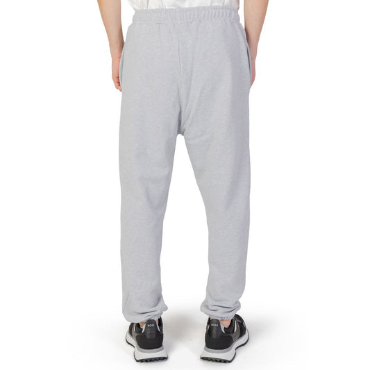 Back view of Underclub gray men's sports pants made from 100% cotton, ideal for autumn/winter collection.