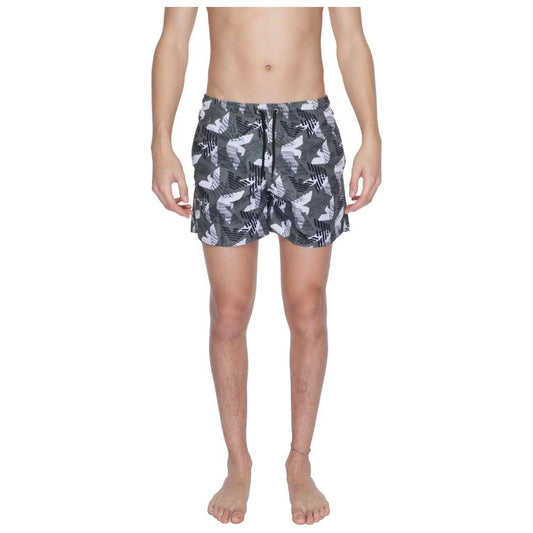 Emporio Armani men's black polyester swimwear with modern design and adjustable drawstring, ideal for beach or pool.