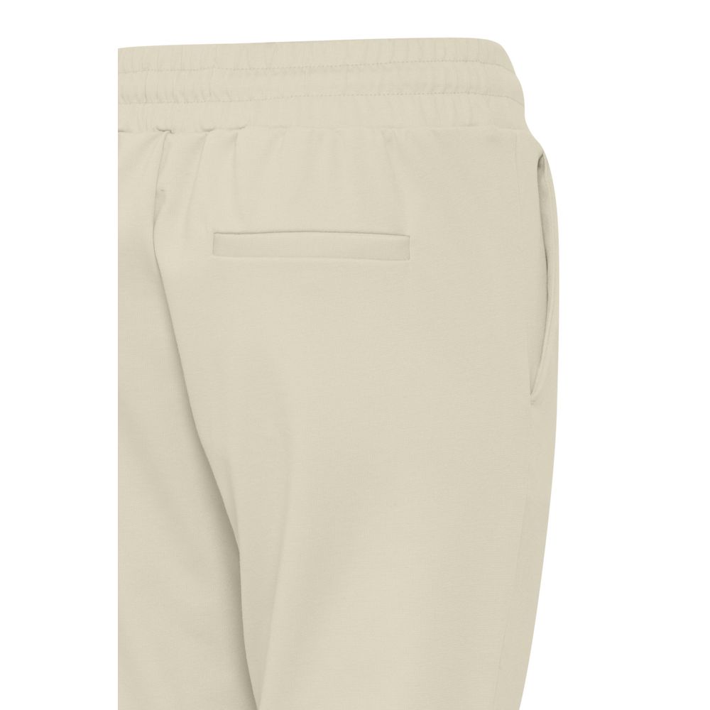 Close-up of ICHI Beige Polyester Pants with elastic waistband and back pocket detail.