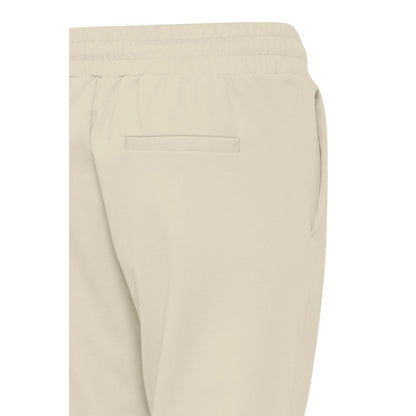 Close-up of ICHI Beige Polyester Pants with elastic waistband and back pocket detail.