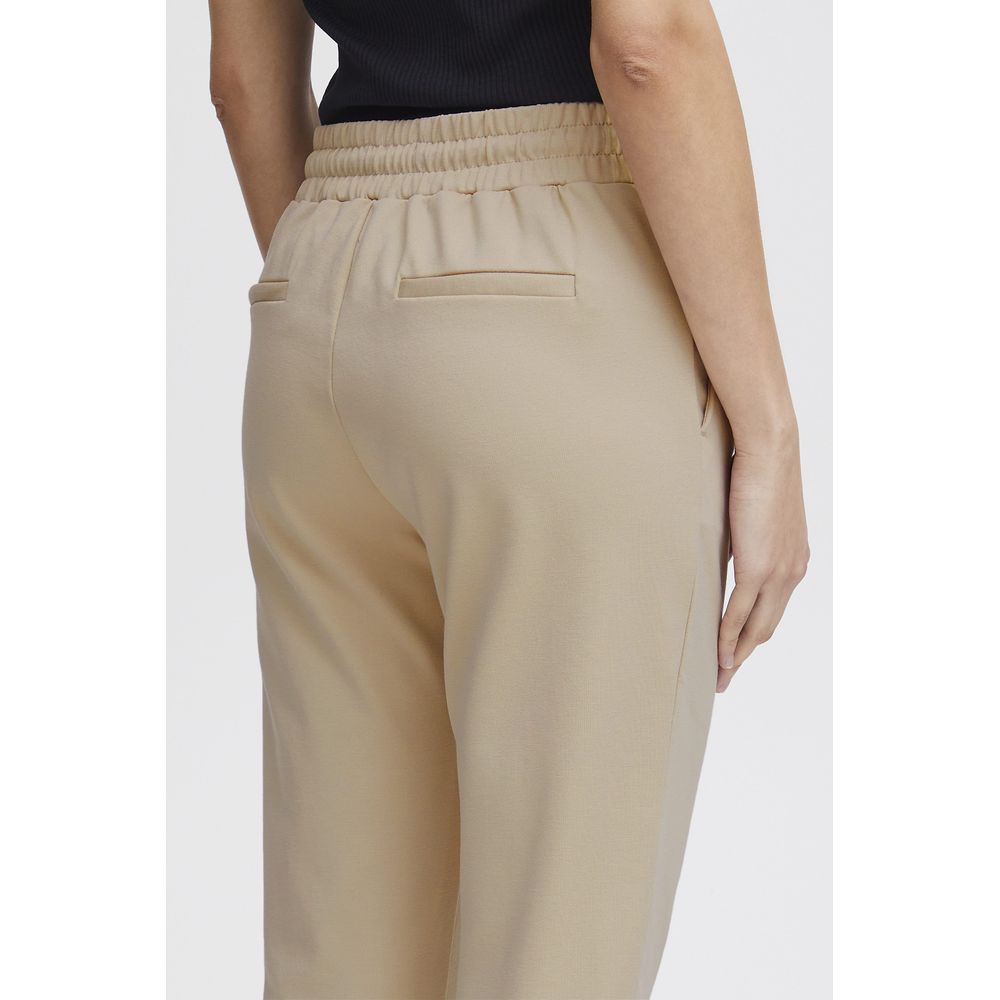 Back view of ICHI Beige Polyester Pants with mid-rise waistband and slim fit design.