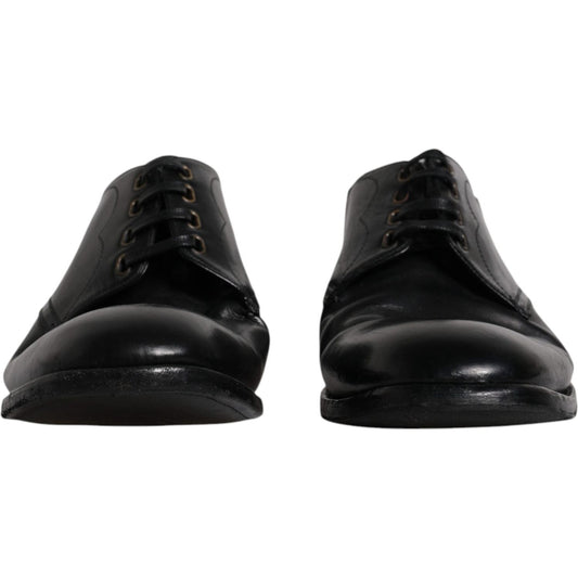 Dolce & Gabbana black leather Derby formal men's dress shoes, calf leather, lace-up with logo details, preowned with minor wear marks.