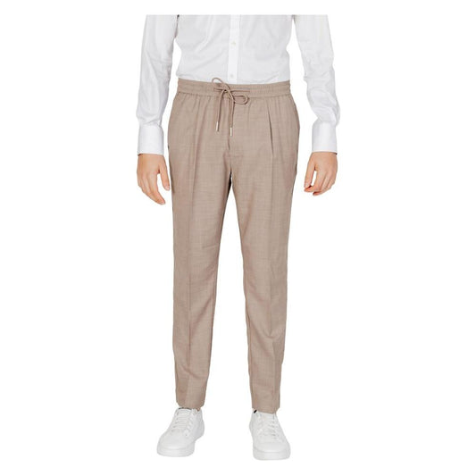 Antony Morato beige polyester men's pants, spring/summer collection, with drawstring, front view on model, casual wear.