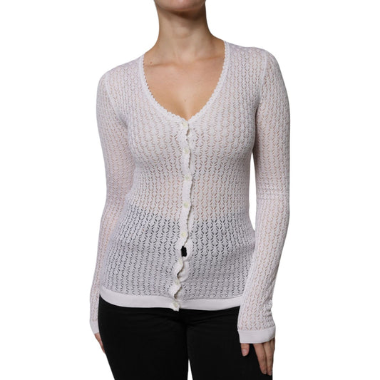 Dolce & Gabbana white silk cardigan sweater, button down closure, V-neck, exclusive Italian craftsmanship, front view, worn model.